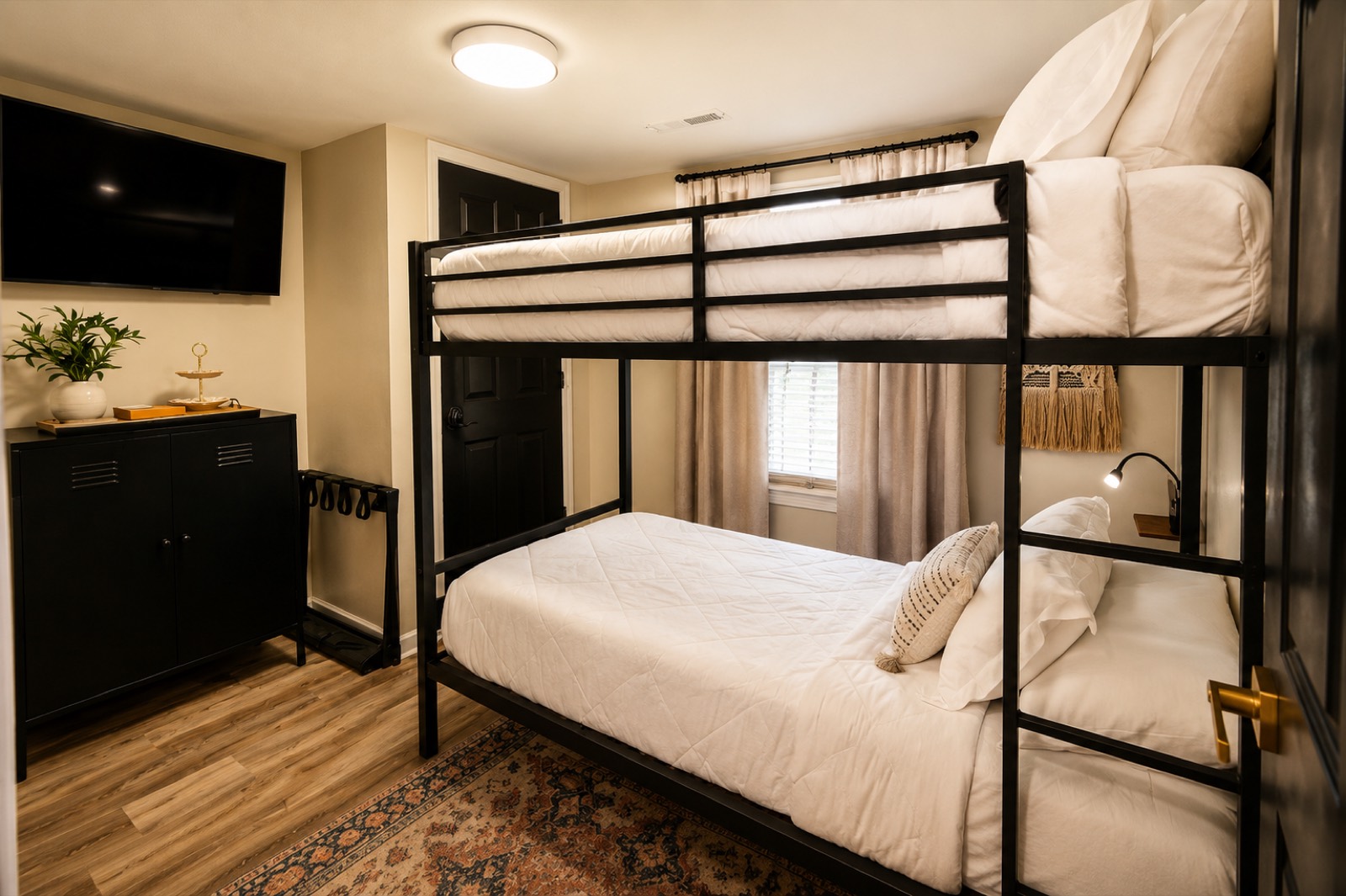 Bunk room with twin bunk beds and smart TV