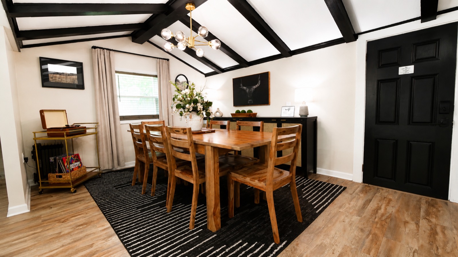 Long dining table in the Corbin furnished home