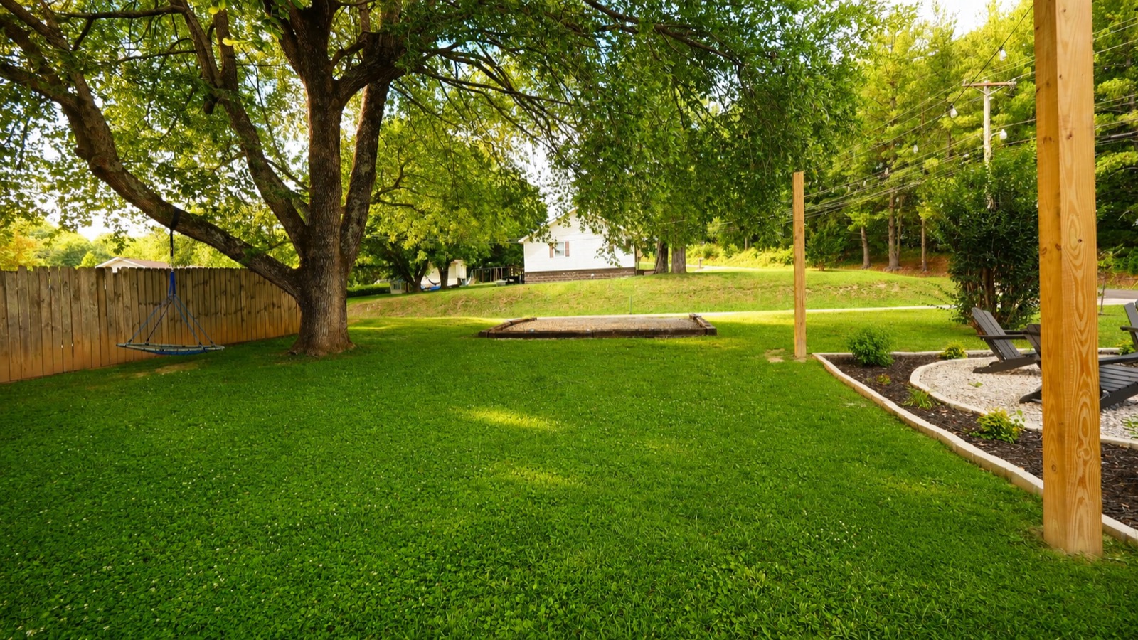 Backyard with mature shade trees