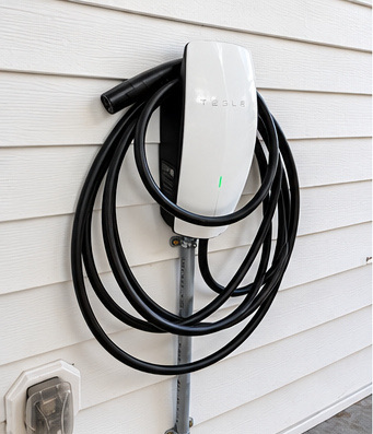 Tesla wall connector for electric vehicle charging